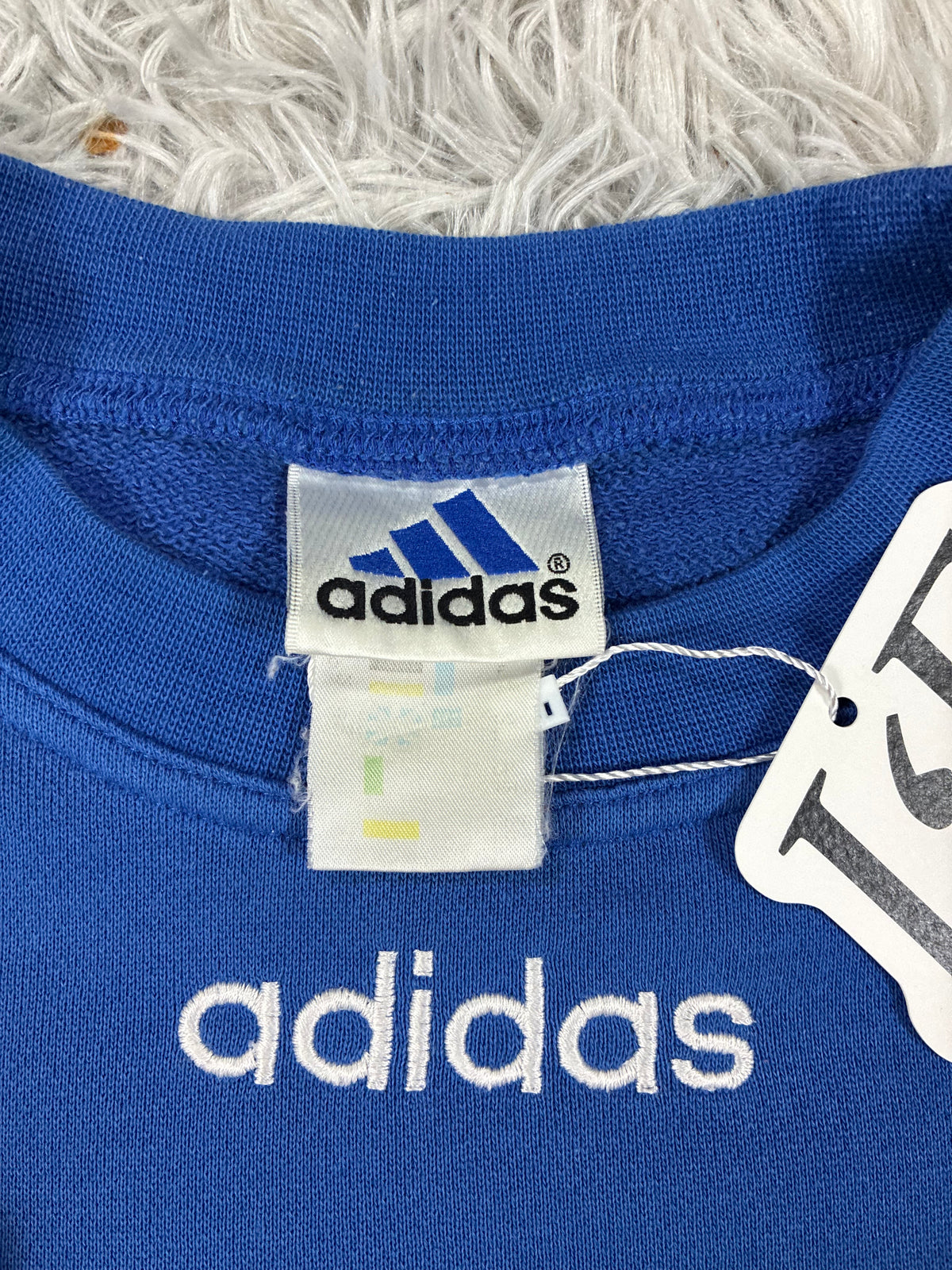 Vintage Adidas Bayern Munich sweatshirt crest close-up
