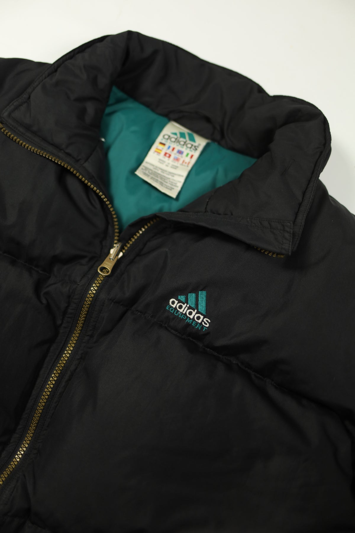 Adidas Equipment puffer jacket zipper detail