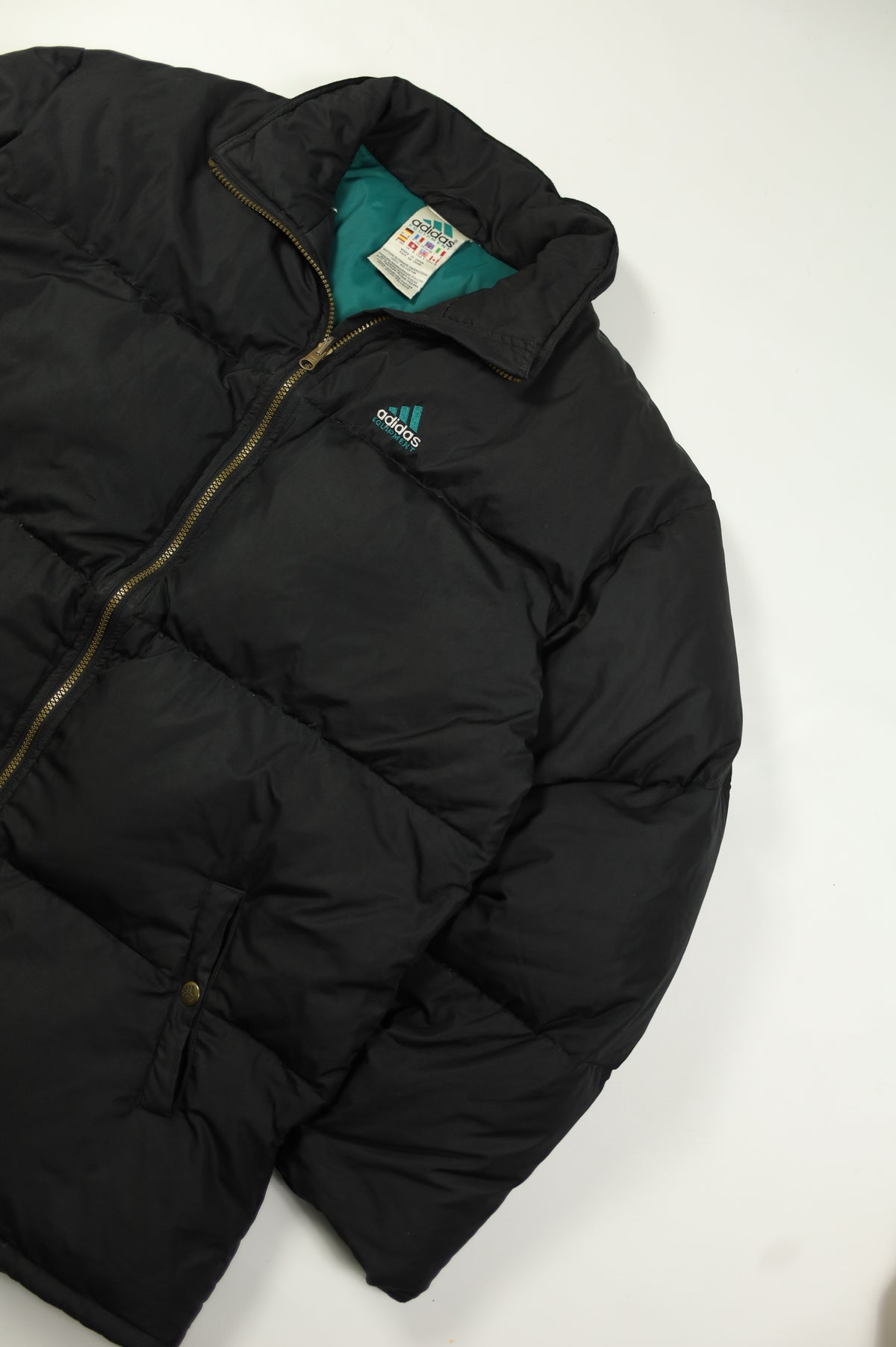 Adidas Equipment black puffer size tag