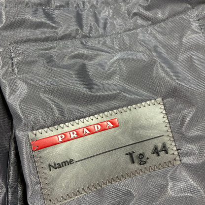 Damen Prada Re-Nylon Regenjacke mit durchgehendem Reißverschluss Größe M