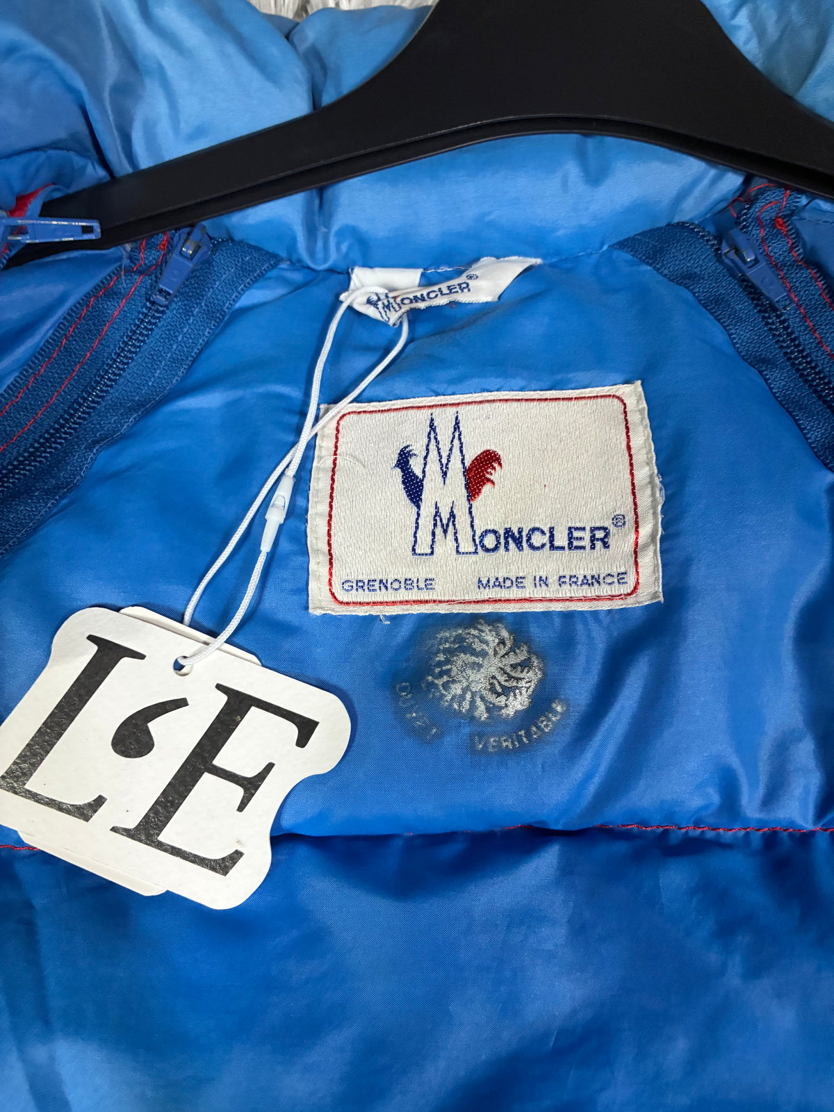 Vintage Moncler Grenoble red puffer hood close-up
