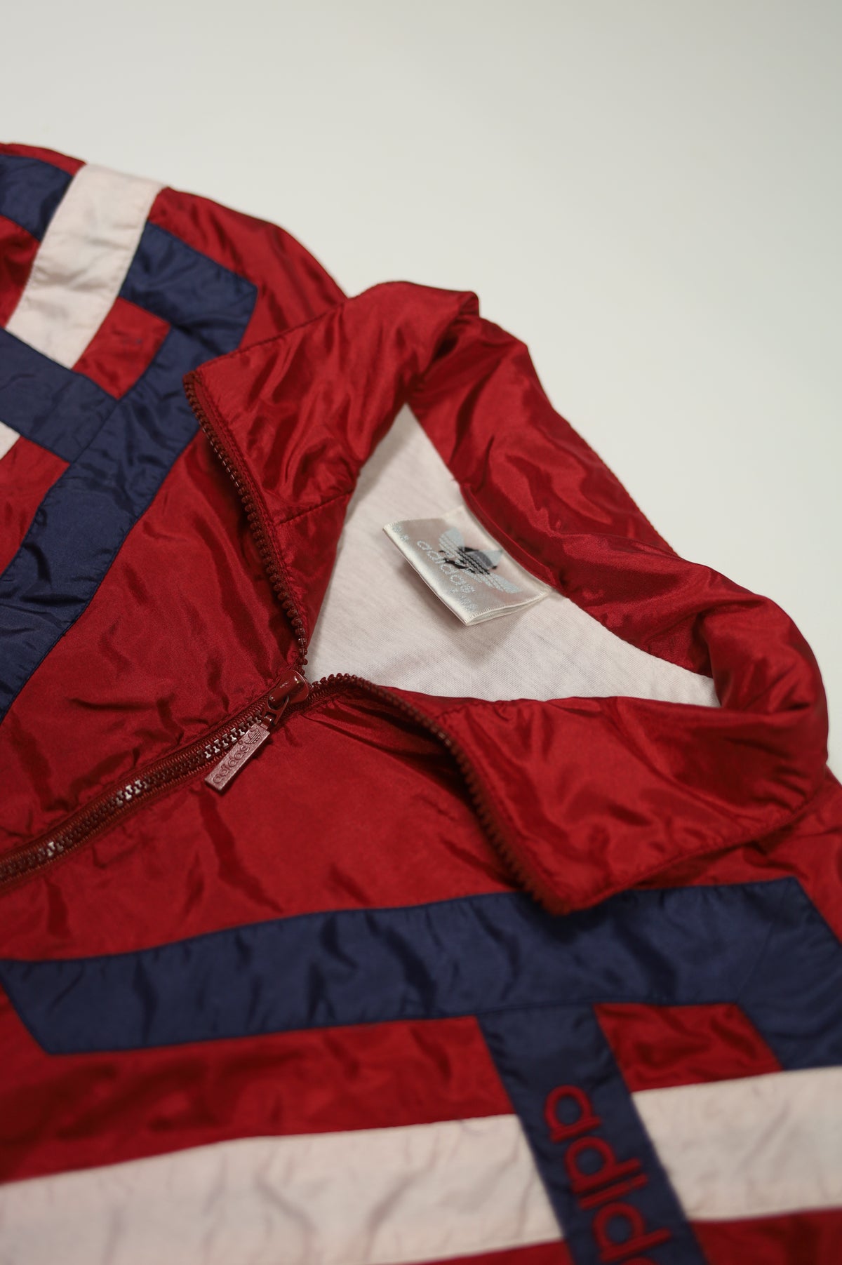 Vintage Adidas nylon jacket logo detail