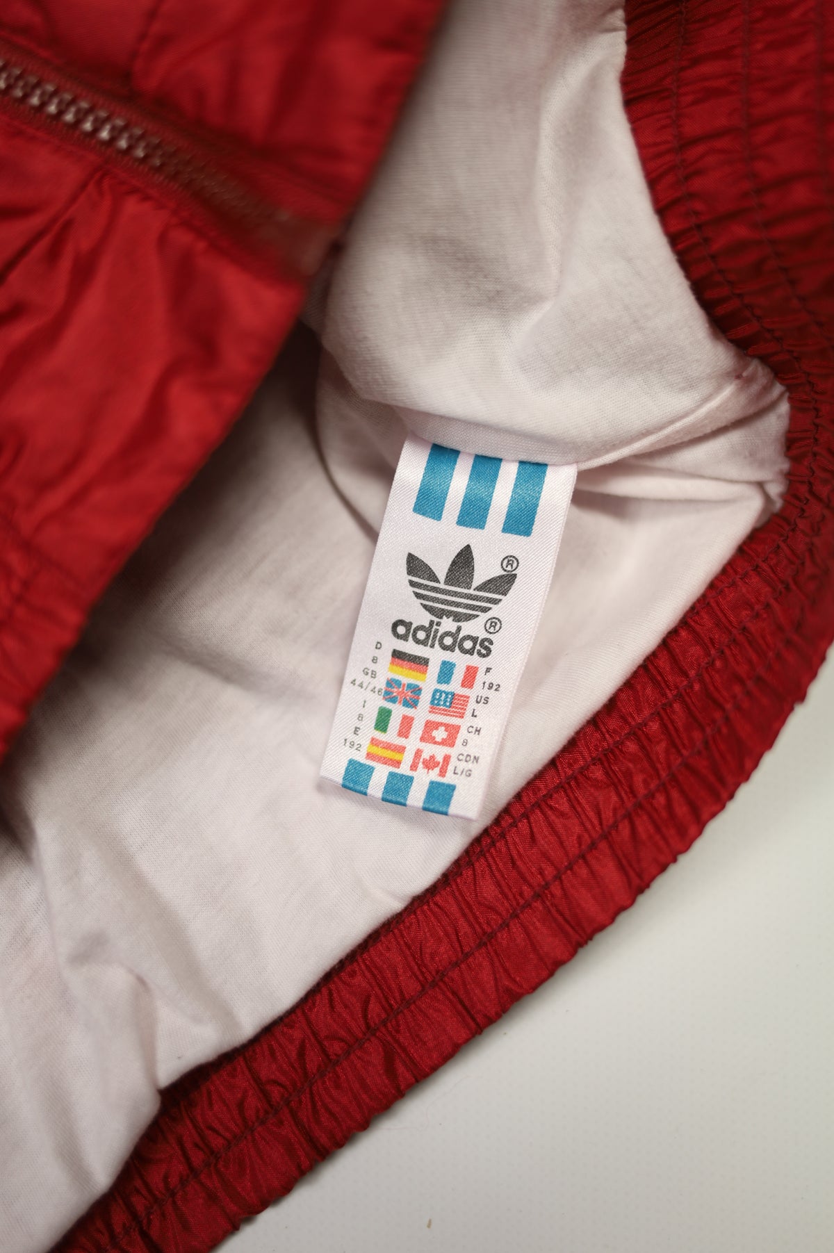 Adidas red nylon Y2K jacket zipper detail
