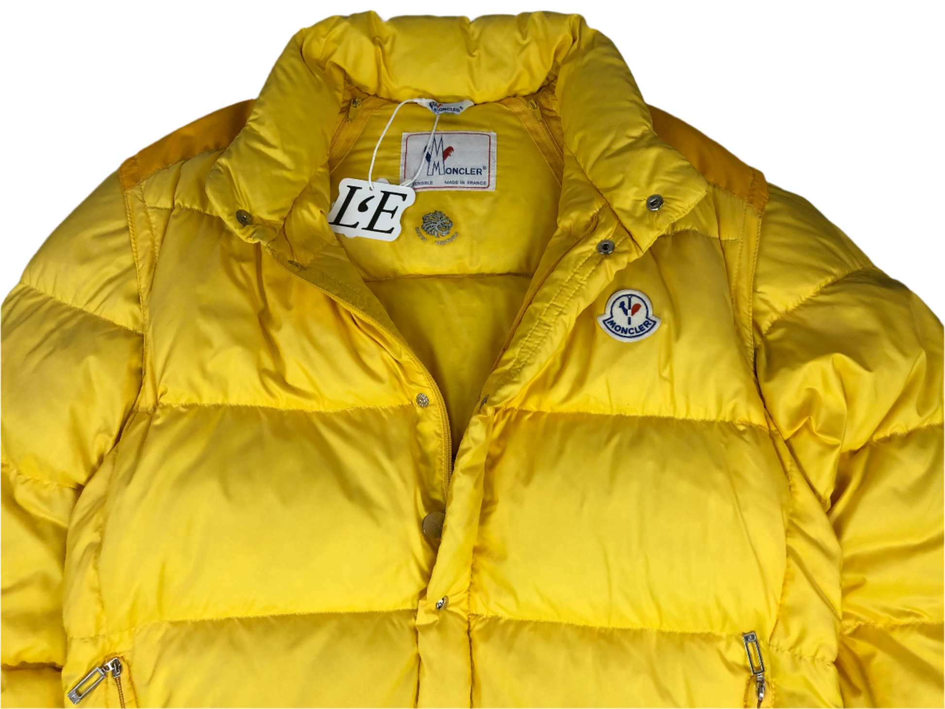 Vintage Moncler Grenoble yellow puffer logo detail