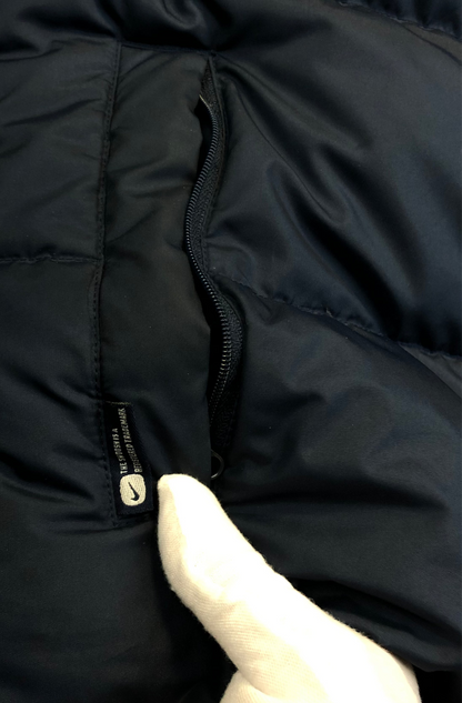 Nike puffer vest zipper detail