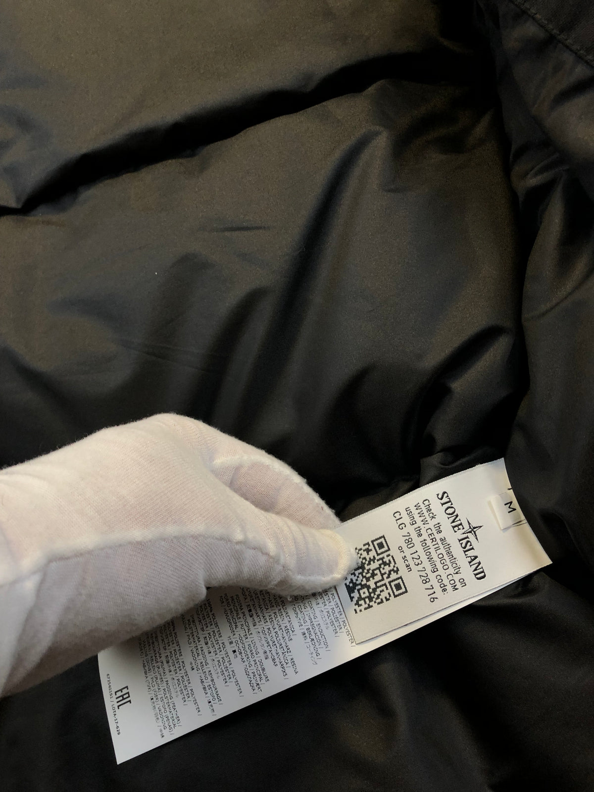 SI x Supreme puffer CLG code tag