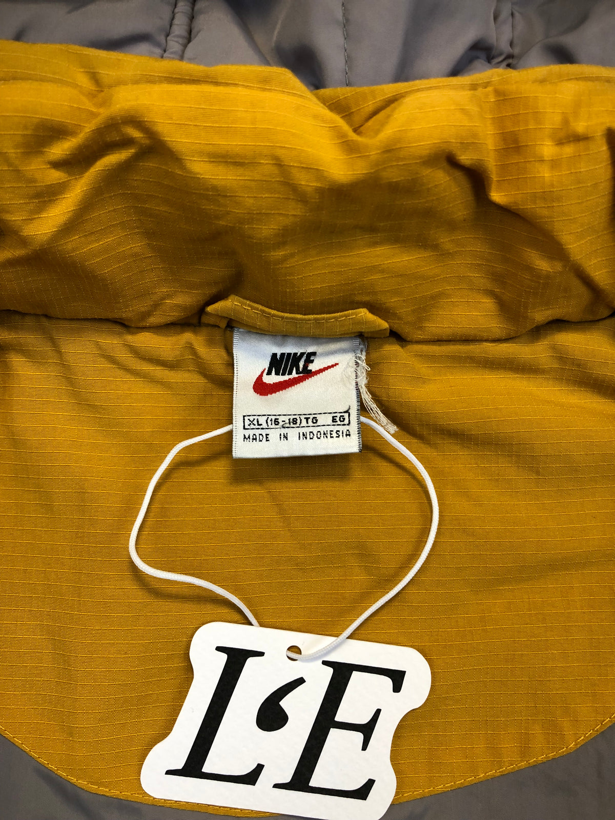 Nike yellow puffer zipper detail