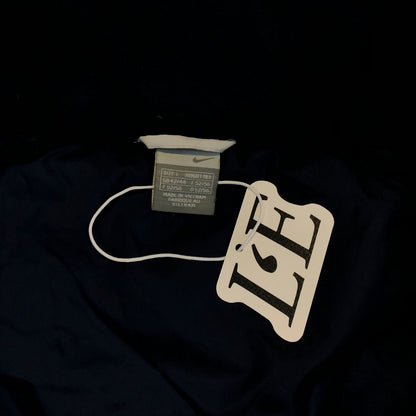 Nike white puffer size tag