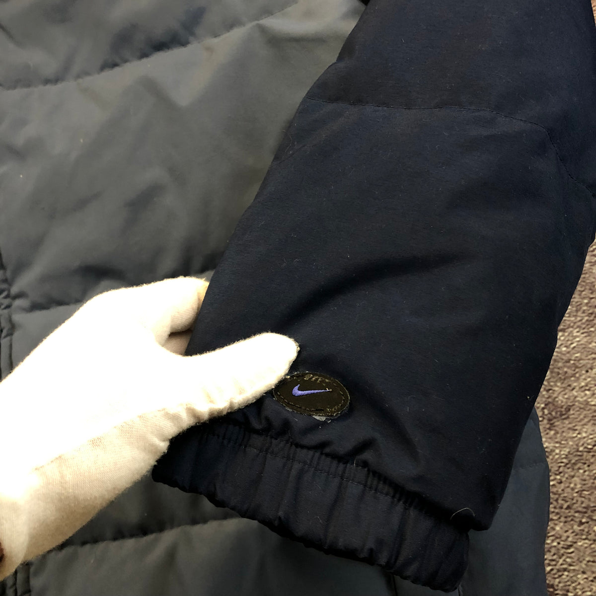 Nike Y2K puffer size tag