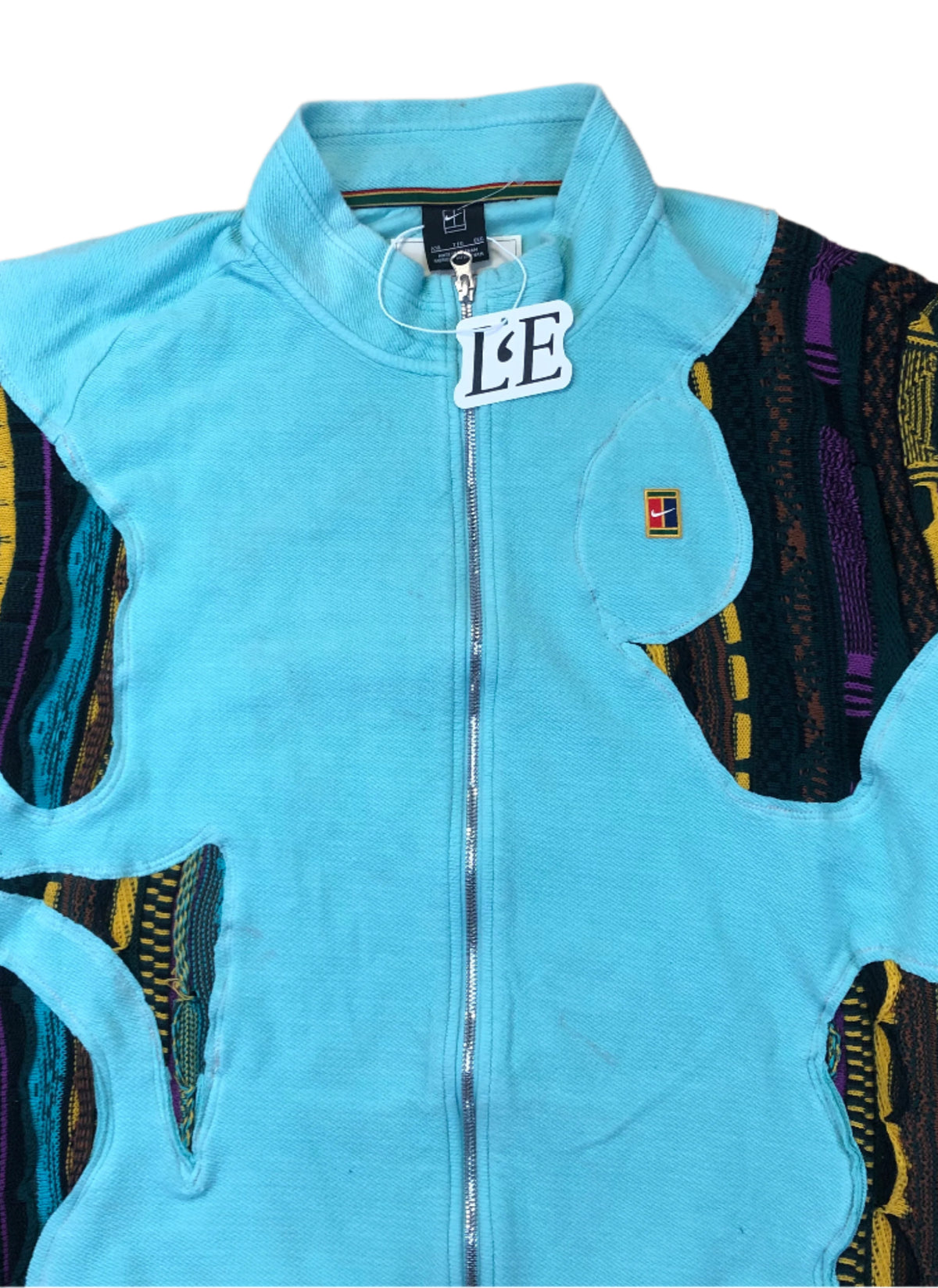 Upcycled COOGI panel on Q-Zip detail