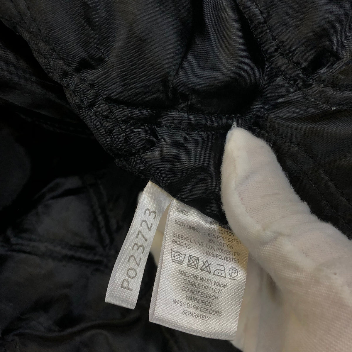 YSL Harrington L size tag