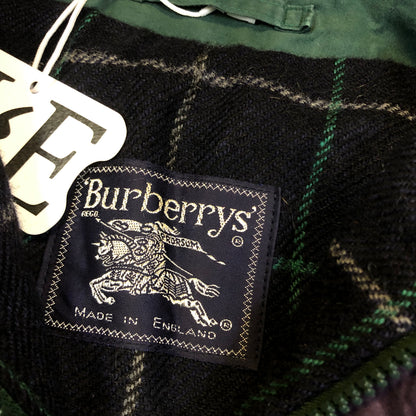 Burberry green Harrington button detail