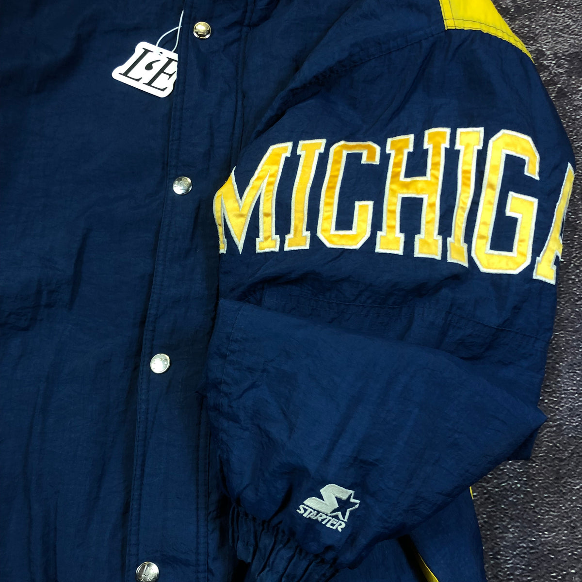 Starter Michigan jacket fabric close-up