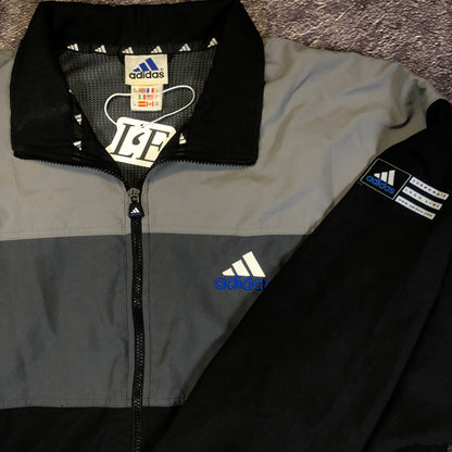 Adidas trefoil logo detail