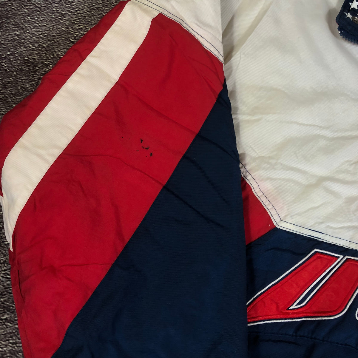 Starter Olympics USA jacket size tag
