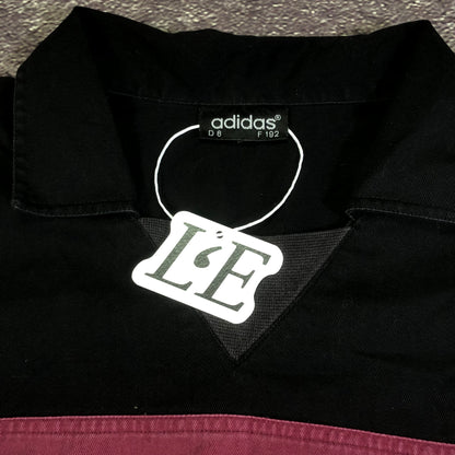 Adidas trefoil logo detail