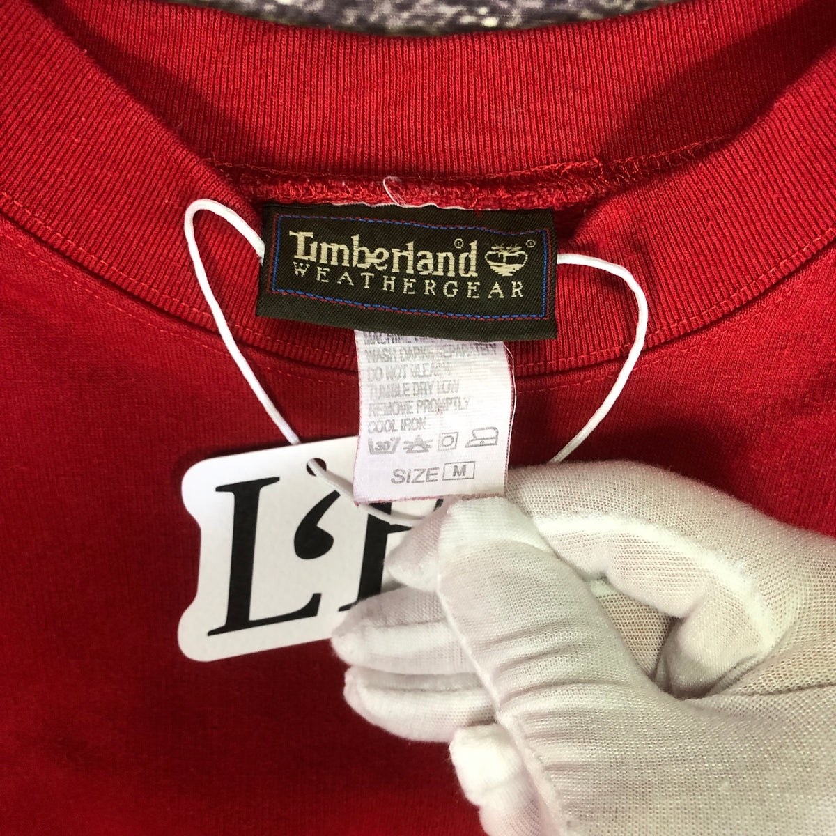 Timberland red sweatshirt logo detail