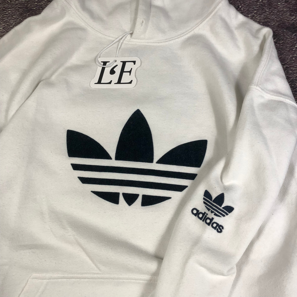 Adidas trefoil logo detail