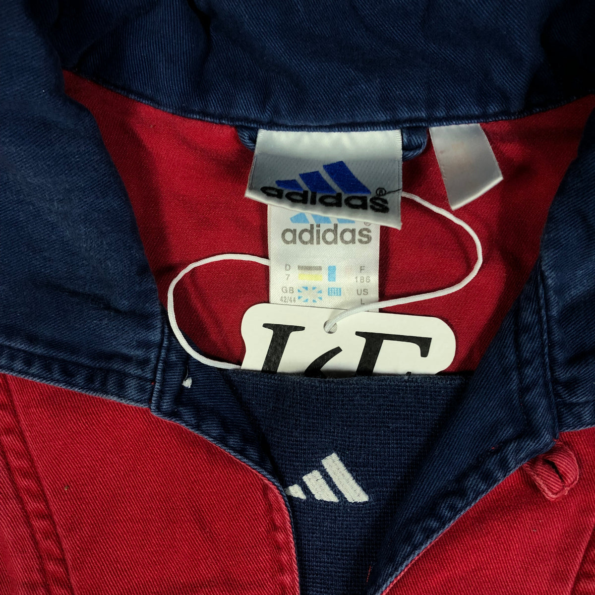 Adidas 1999 jacket logo detail