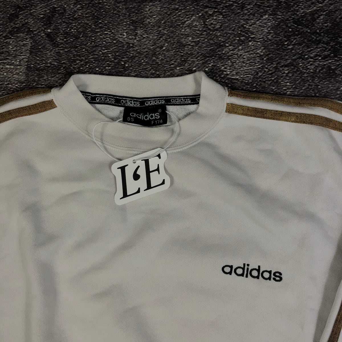 Adidas 1999 white sweatshirt logo detail
