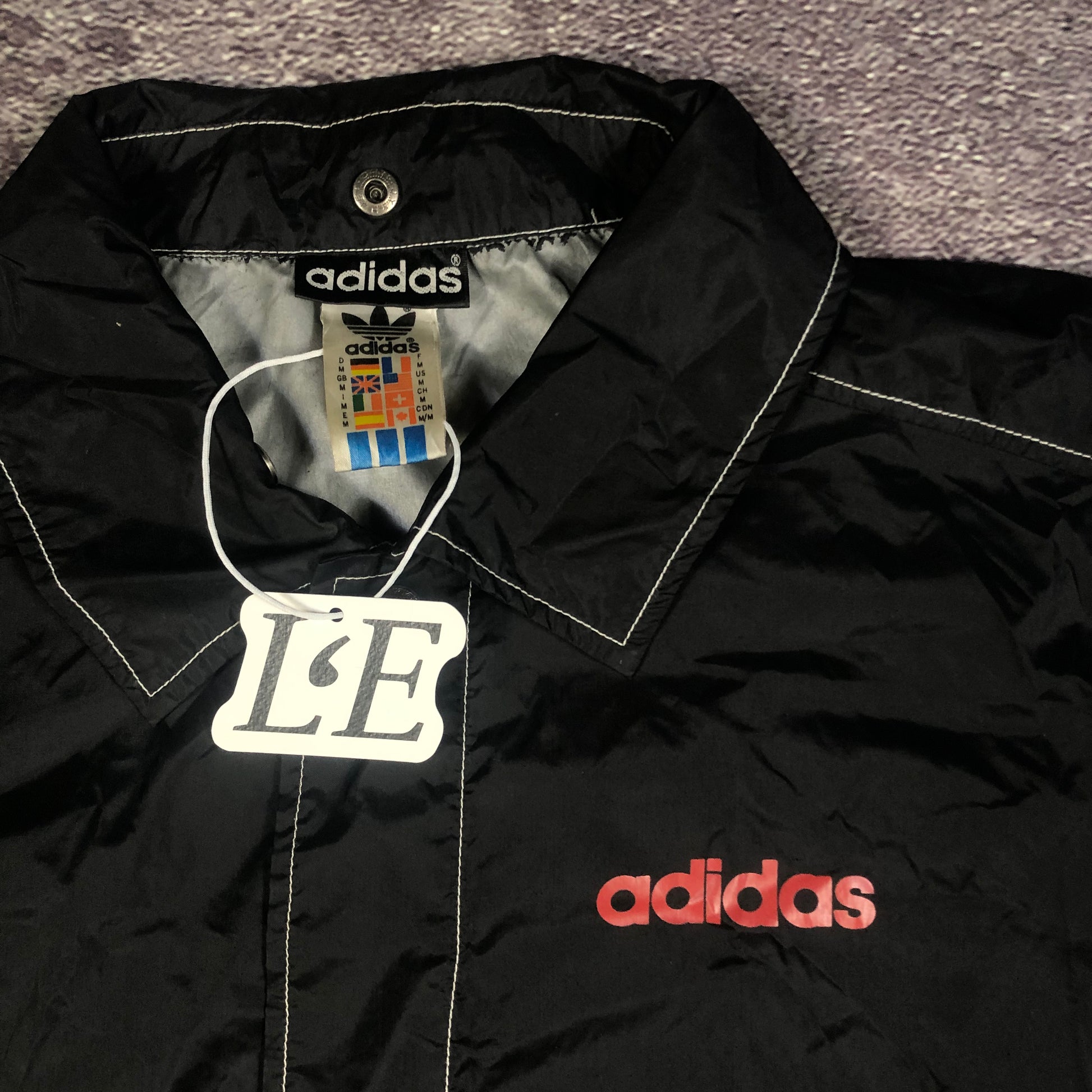 Adidas trefoil logo detail